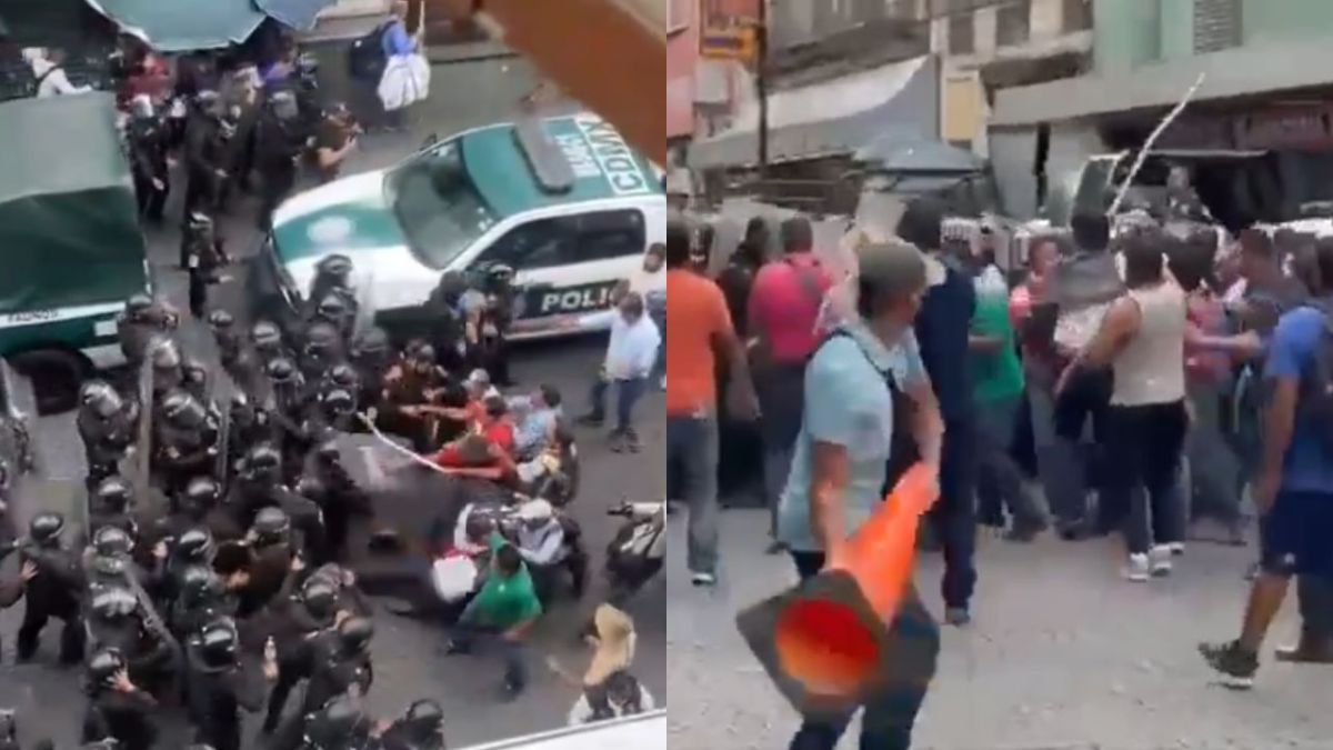 CNTE protesta en Palacio Nacional por desalojo en Oaxaca; agreden a policías