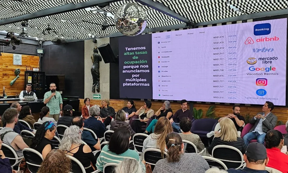 Defensa. En conferencia, anfitriones de alojamientos apuntaron que no son la causa de la gentrificación y conmina a que  se prohíba la participación de grandes desarrolladores inmobiliarios en el negocio. 