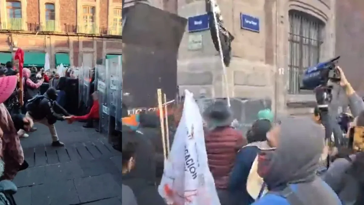 Presuntos miembros de la CNTE intentan derribar vallas en Palacio Nacional