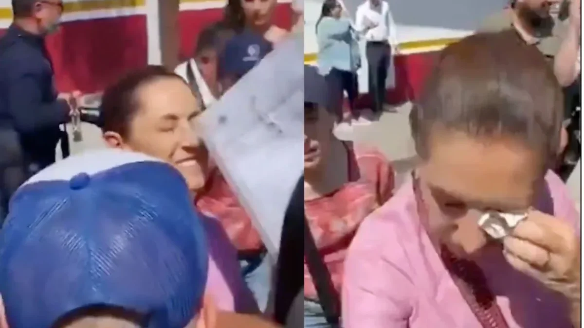 Al tomarse selfies, recibir regalos y peticiones en Nayarit, una persona trató de acercarle un folder a Sheinbaum pero le picó un ojo.
